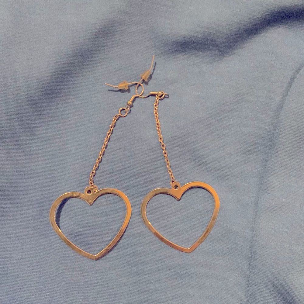 Silver heart shaped dangle earrings